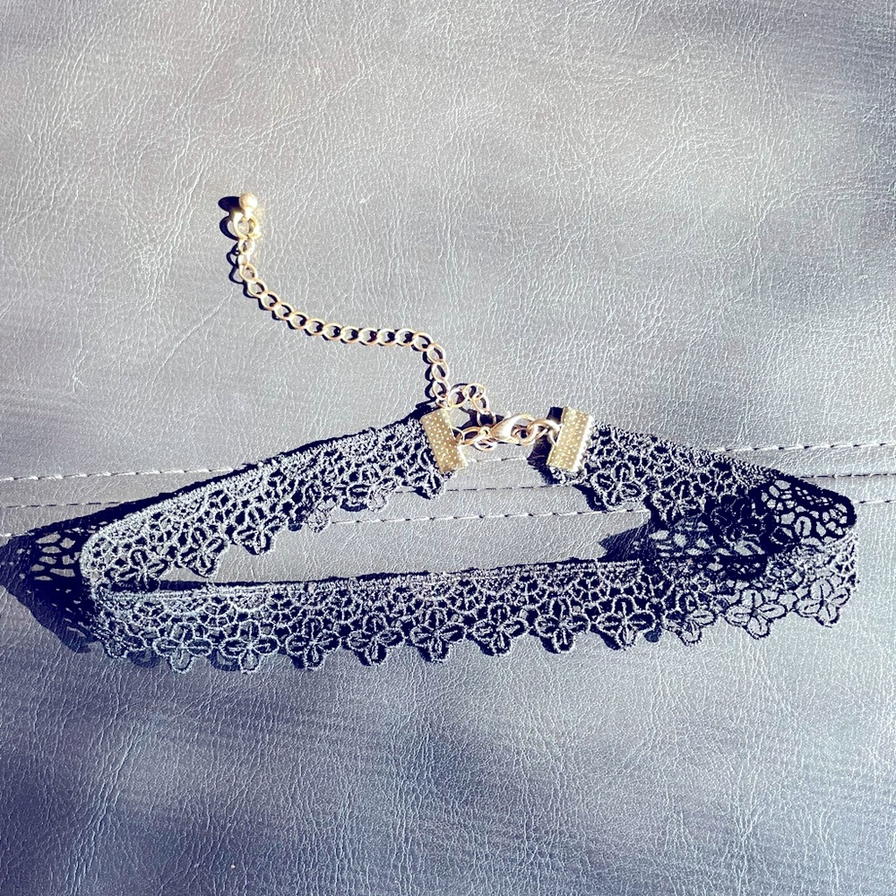 Black lace choker, gold metal clasp